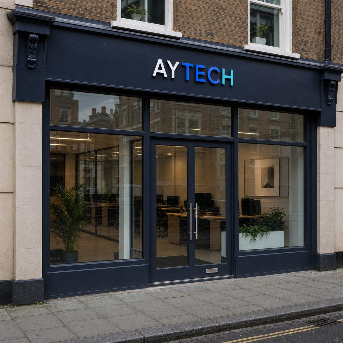 AyTech Solutions brand identity applied to a shopfront